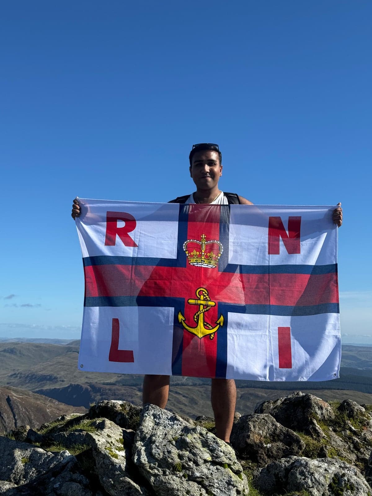 Aberystwyth councillor completes four-peak RNLI challenge and raises £948 visual